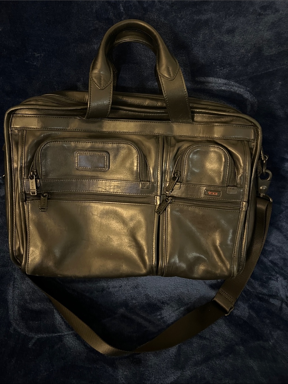 Tumi Black Leather travel Briefcase with lots of pockets